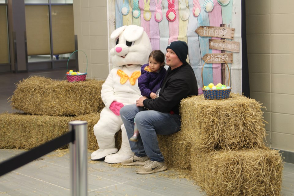 Families took time to pose for a picture with the Easter bunny during the City of Cold Lake’s Easter Party on March 28. 