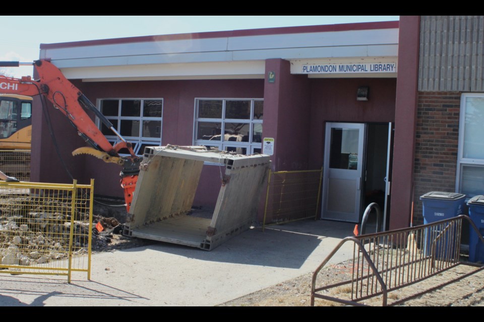 The cleanup continues at Ecole Plamondon School.   Image Chris McGarry