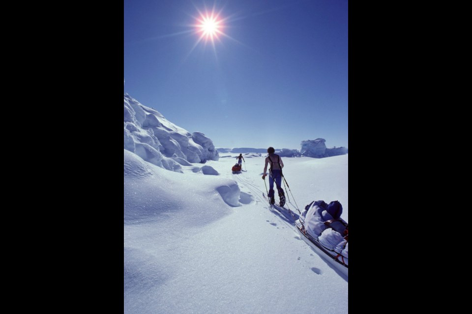Dunn and a member of his team skiing on Ellesmere Island. Copyright John Dunn/Arcticlight.