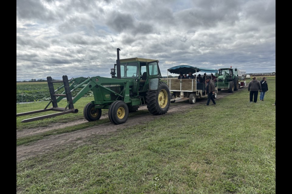 Visitors toured Charlotte Lake Farms by tractor, where the owners proudly showcased their cattle, crops, and wells.

Photo: Chantel Downes.