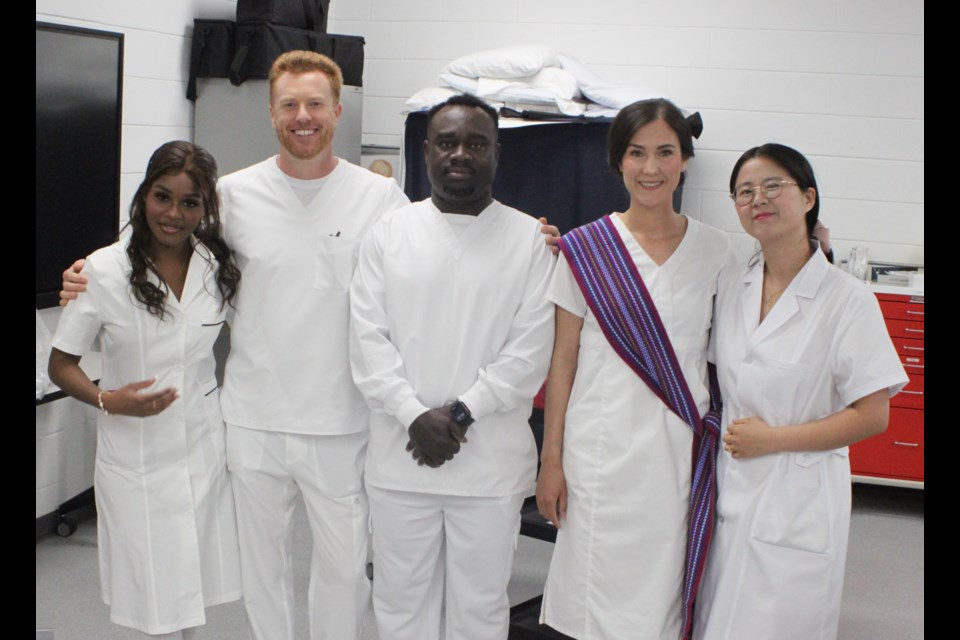 Graduates of the Portage College practical nursing program who studied at the Lac La Biche campus, left-right; Natasha Charley, Jason Bouvier, Abayomi Adesanya, Meaggan Thom, Youngja Yang. Chris McGarry photo. 