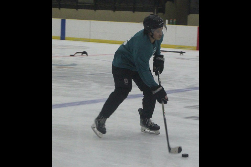 U18 player Gavin Dion, who attended Ski’s Hockey Skills camp at the Bold Centre from July 2-5, races down the ice during a practice drill. Chris McGarry photo. 