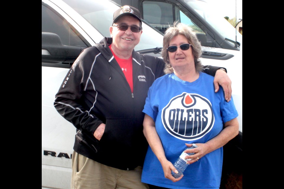 Herman and Crystal Tremblay outside of the Parkland II Motel roughly half an hour after arriving in Lac La Biche on Tuesday evening. Chris McGarry photo. 