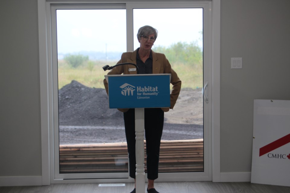 Ann-Marie Reddy, President and CEO of Habitat for Humanity Edmonton started off the ceremony by explaining the goals of Habitat for Humanity Edmonton and how excited and happy they are for the home owners.
