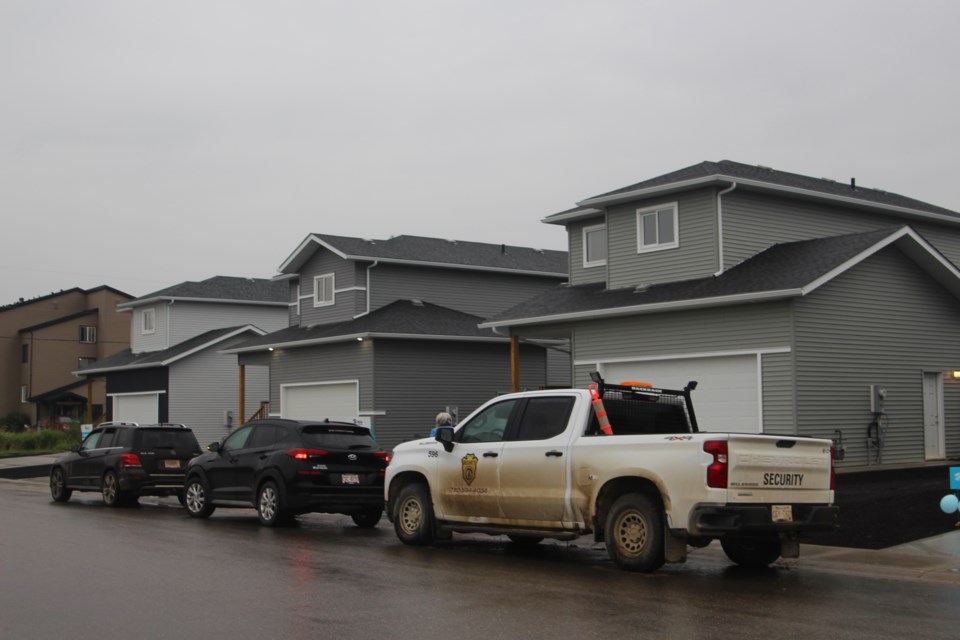 Three out of the four newly built houses that are ready for new owners with Habitat for Humanity Edmonton.