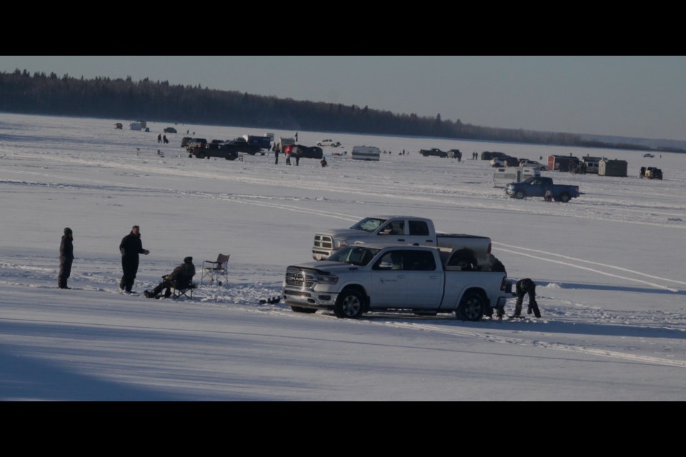 People enjoy an afternoon of ice fishing on Lac La Biche lake on Feb. 19. The ice fishing season ends March 31. Chris McGarry photo. 