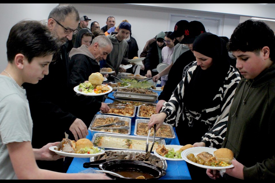 Members of the Lac La Biche Muslim community gathered inside the basement of the Al Kareem Mosque for an Iftar meal on Saturday, April 6. Iftar is the fast-breaking meal during the Ramadan period that takes place at the time of Adhan (call to prayer) of the Maghrib (sunset) prayer. Chris McGarry photo.