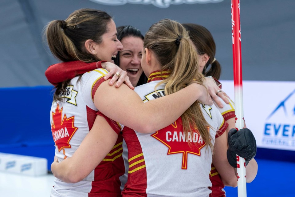 Team Canada celebrates their win on Sunday night.