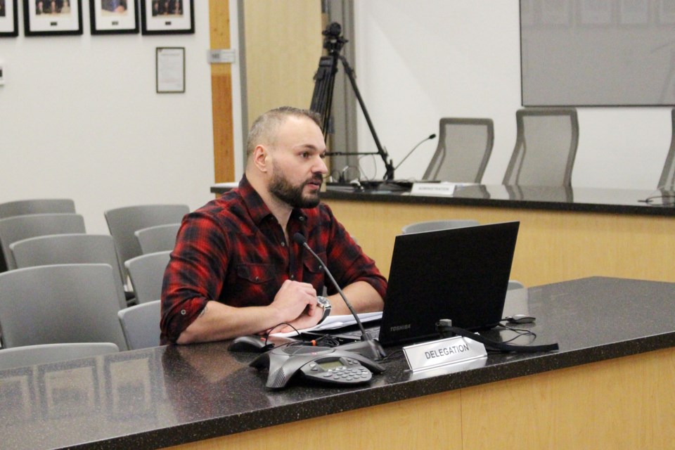 Michael Bisaga, environmental monitoring programs manager for the Lakeland Industry and Community Association (LICA), outlined the results of their air quality tests to town council on Feb. 25. Photo by Robynne Henry. 