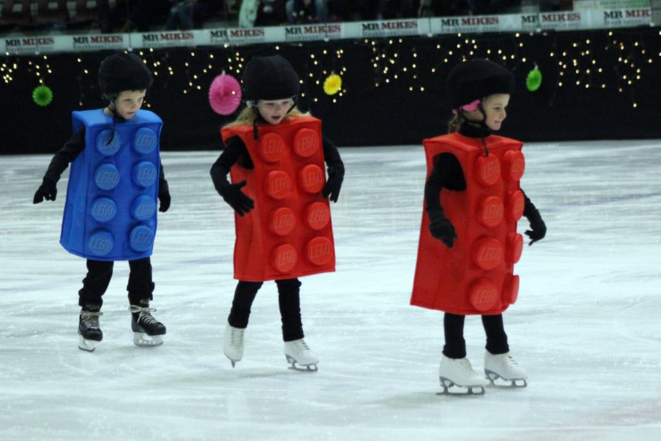 During the Bonnyville Skating Club's annual Skating Carnival on Sunday, March 8 at the Bonnyville Centennial Centre, Kaia Isley, Emerson Poole, and Roman Kalinsky shared that Lego makes them happy. Photo by Robynne Henry. 