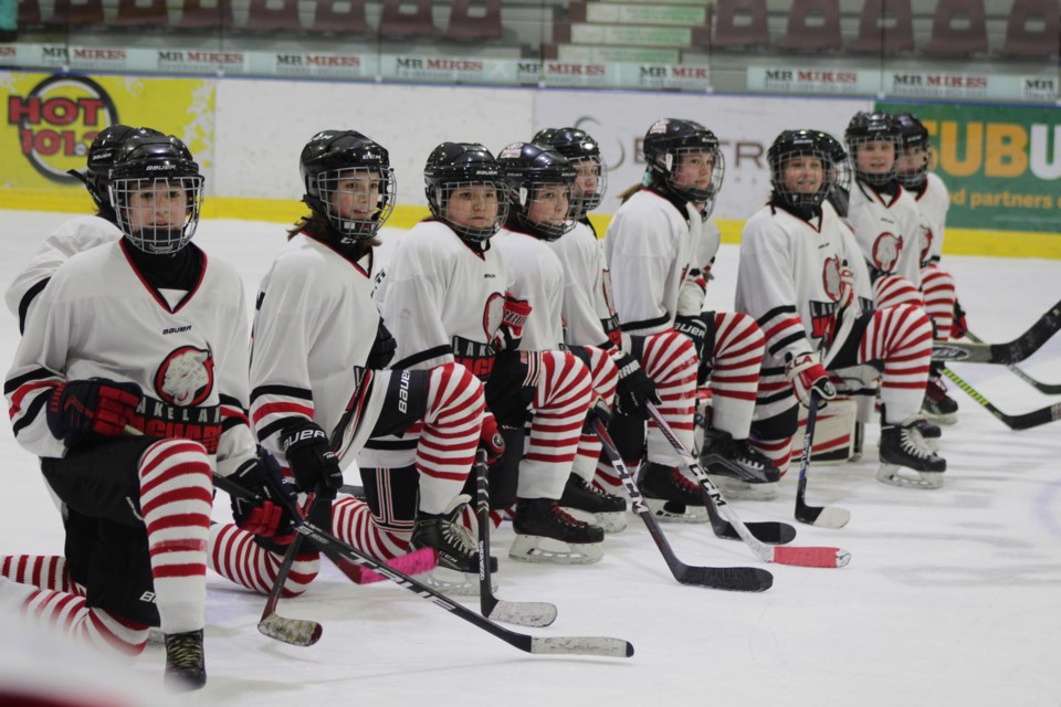 Atom and peewee teams donned the Ronald McDonald House Charities' iconic red and white striped socks for the third annual Winterland Invitational from Feb. 14 to 16 in Bonnyville, Glendon, and Elk Point. Photo by Robynne Henry. 