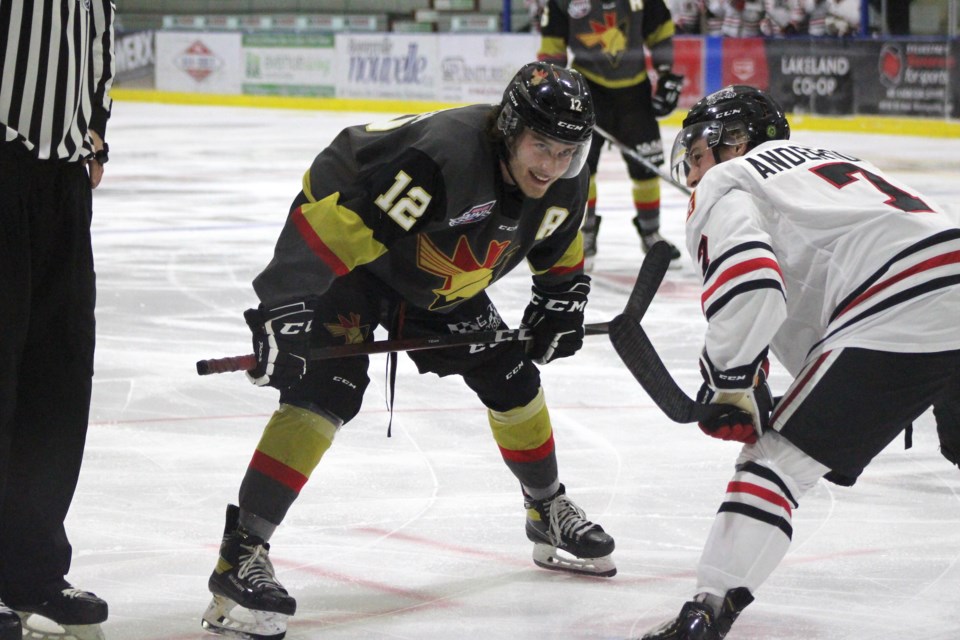 Bonnyville Pontiac Kash Rasmussen waits for the puck to drop during their game against the Whitecourt Wolverines on Saturday, Nov. 21. Photo by Robynne Henry. 