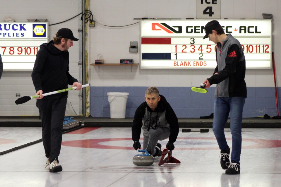 During the Bonnyville Men’s Curling Bonspiel, teams went head-to-head to see who would come out on top.
(left to right) Jeff Graham, Darwin Zalaski, and Jared Zalaski. Photo by Robynne Henry. 