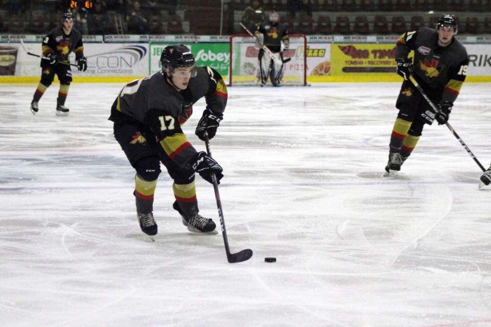 During the Bonnyville Jr. A Pontiacs game against the Grande Prairie Storm on Sunday, Feb. 23, Austin Saint makes his way down the ice. Photo by Robynne Henry. 