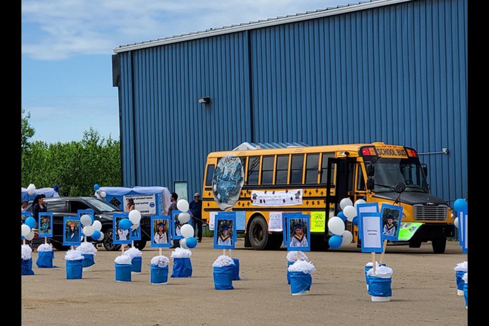 The Adby's bus with posters covering the side was part of the drive-thru procession at Beaver Lake.