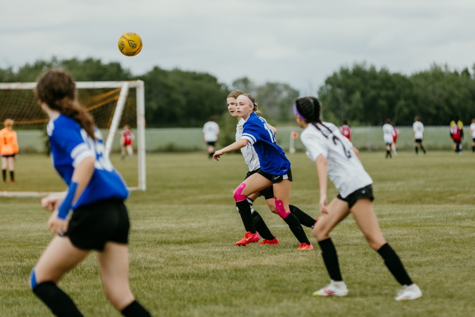 U15 girls' teams take to the pitch.