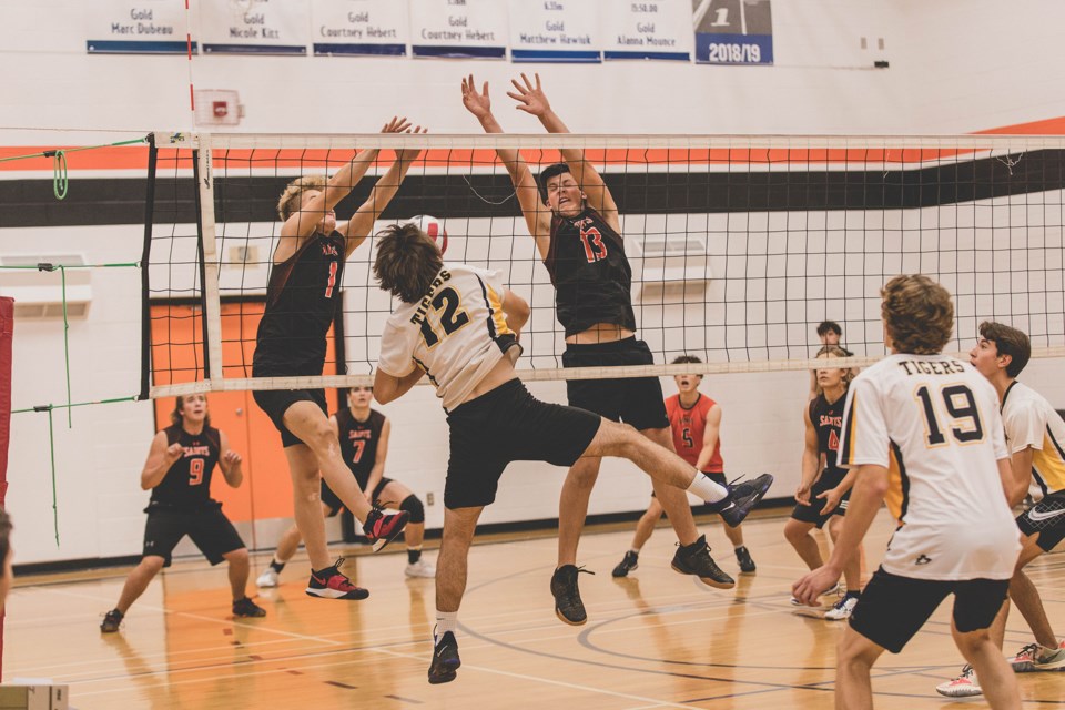 Friday night action on the St. Paul Regional High School volleyball courts.