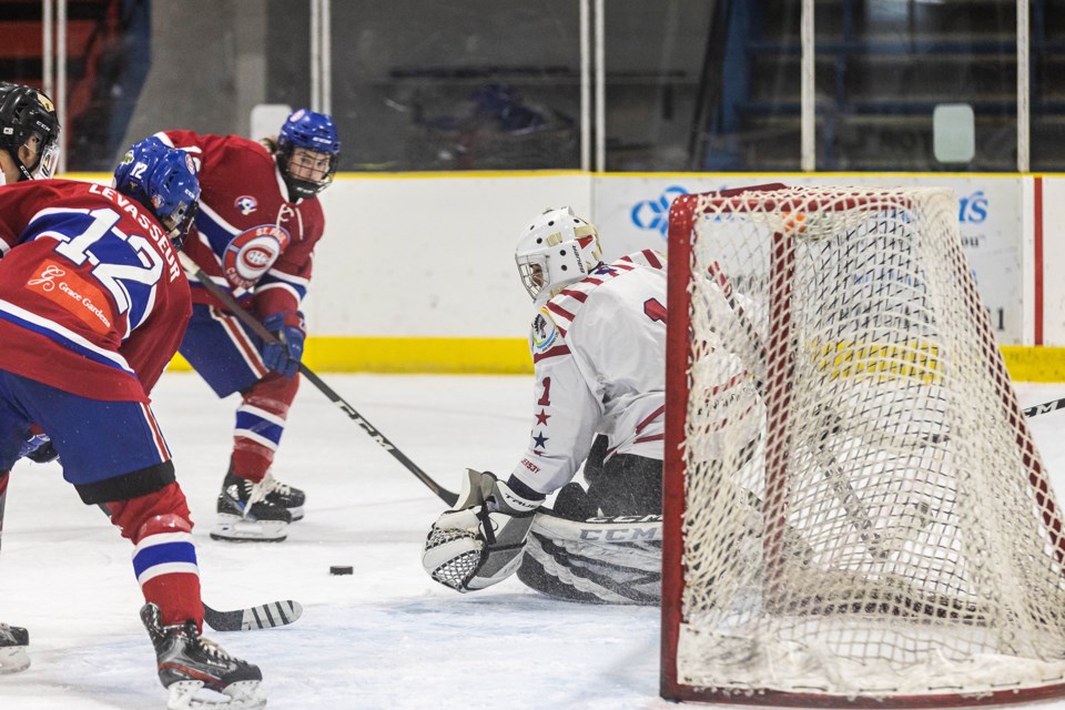 Friday night action from the Clancy Richard Arena in St. Paul.