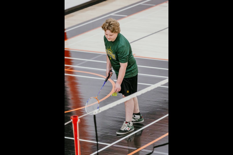 Students from Glendon School participate in a badminton tournament on April 13.