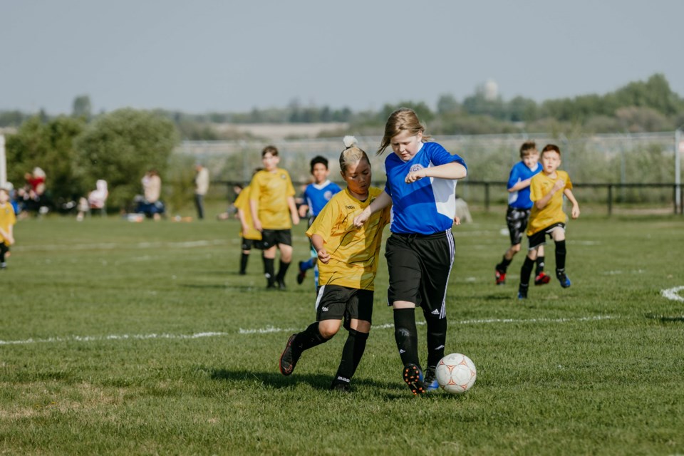 U11 soccer players from St. Paul and Lac La Biche play during the Xtreme Oilfield St. Paul Mini-Tournament. / Janice Huser photo