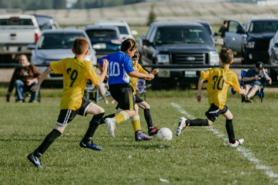 U11 soccer players from St. Paul and Lac La Biche play during the Xtreme Oilfield St. Paul Mini-Tournament. / Janice Huser photo