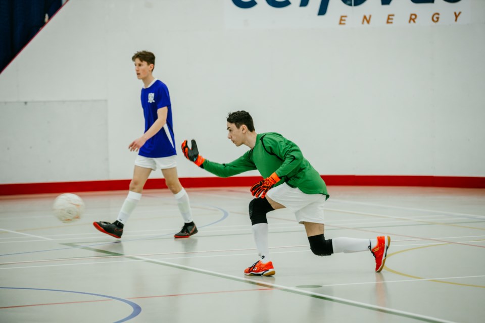 Lakeland United U17 goalie Ethan Loughran tosses the ball during a game against the Bonnyville U17 boys' team.