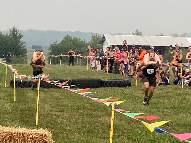 Finally ... a wife-carrying race comes to Lac La Biche County.  The fun and surprisingly gruelling competition was hosted by the Lac La Biche Agricultural Society and drew a wide range or racers.  The fringe 'sport' is a global thing (really), and the Lac La Biche races  — part of the Lakeland Country Fair — are the only sanctioned races in Canada. The event will likely become a regular feature at the Country Fair.