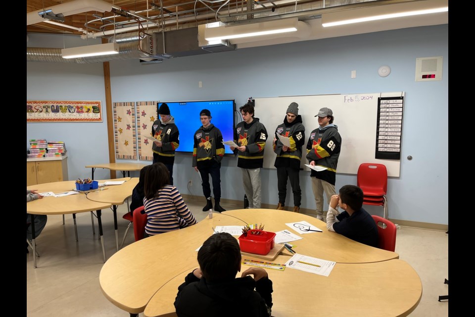 The Bonnyville Pontiacs Jr. A team has been busy on and off the ice. The team is now in second place in the AJHL and also stopped by a few schools spreading anti-bullying messages. Pictured are players visiting students in Kehewin.