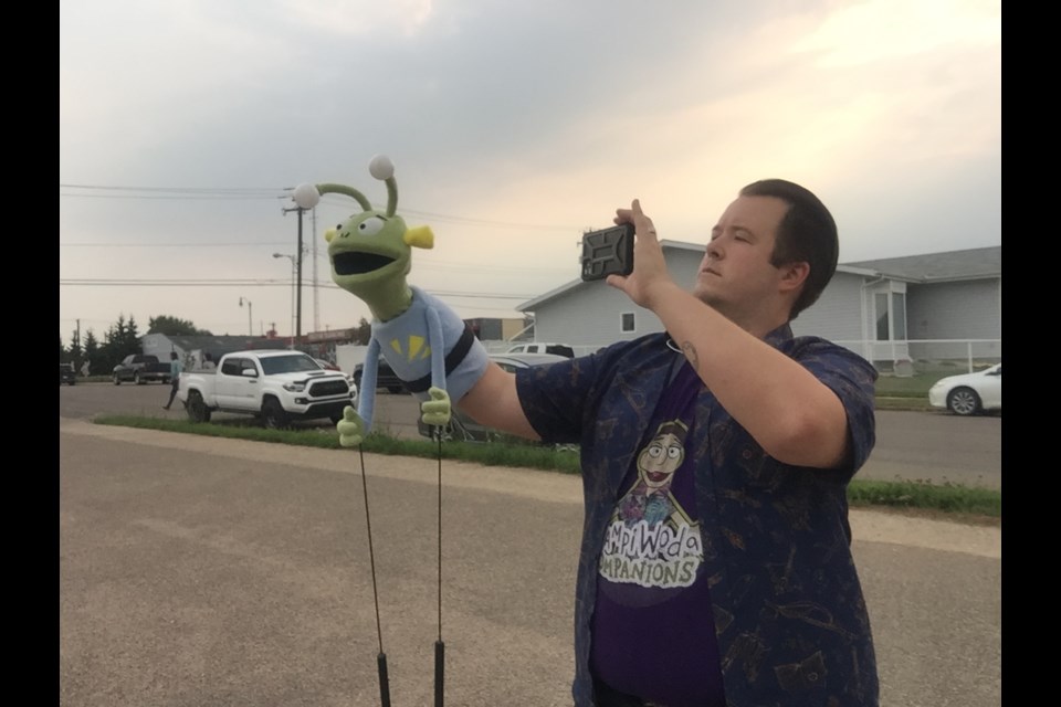 T.U.G and puppeteer Braden Campeau are shining an intergalactic light on hometown businesses as part of a St. Paul & District Chamber of Commerce shop local campaign. Submitted photo
