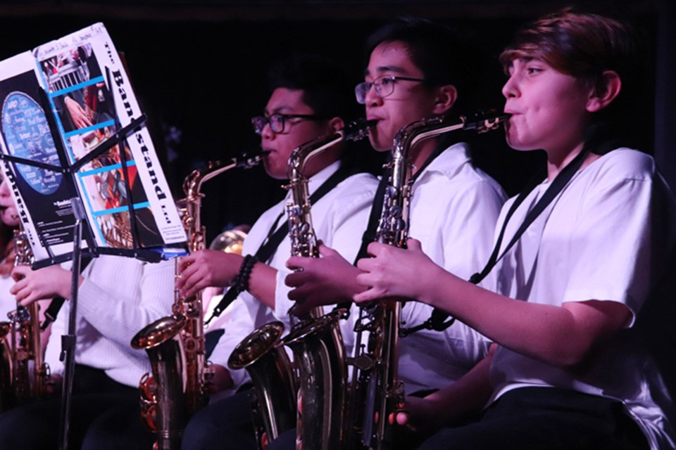 (left to right) Chauncy Soaygan, Jum Dacullo, and Brodie Snow take it away on the saxophone. 