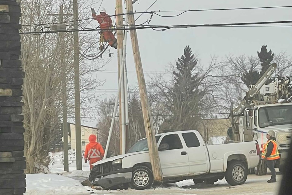 A reader sent in this image, taken on Friday, as crews work to restore power.