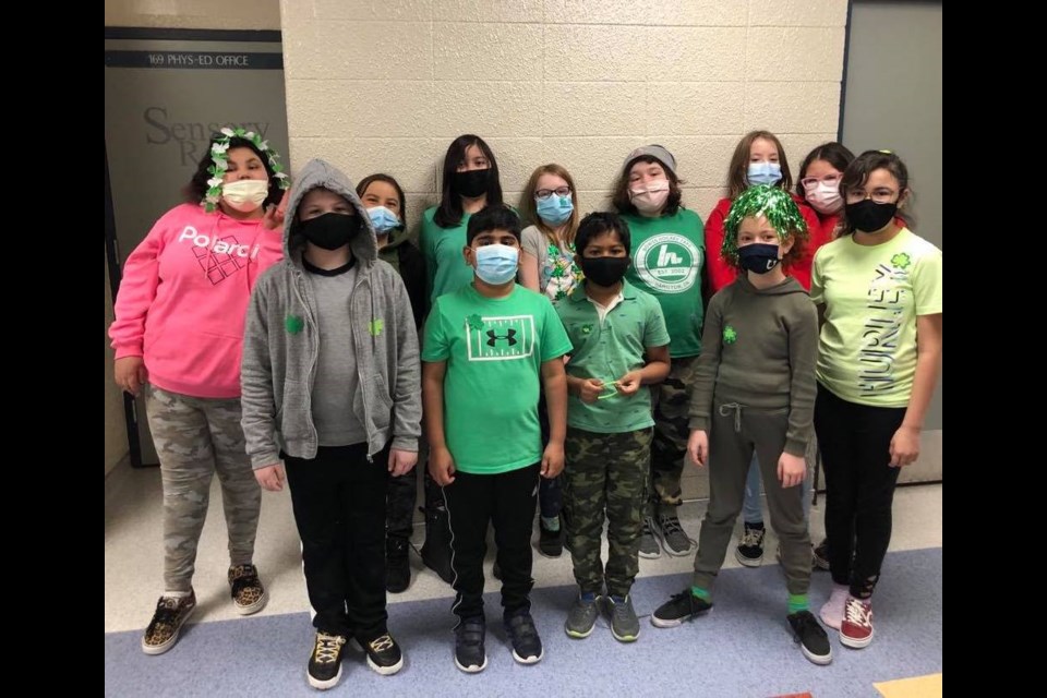 Students in Irish green and St. Patrick's green accessories in hte halls of Aurora Middle School last Wednesday, March 17.    Supplied photo