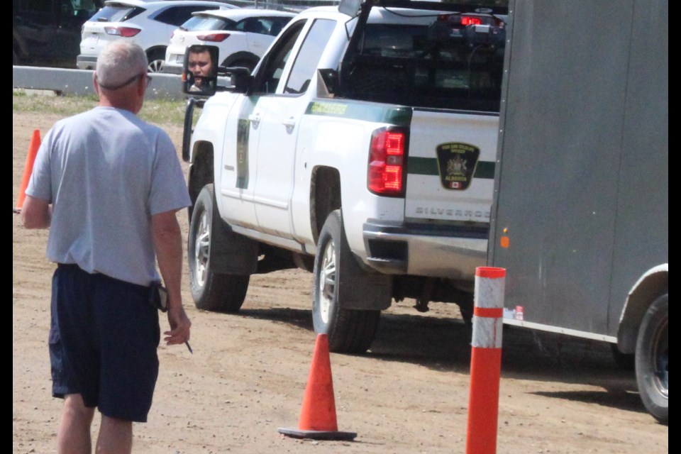 A Fish and Wildlife officer checks the mirror as he backs up a panel trailer in a marked training area last week. The training is part of the programming offered at the Lac La Biche County Law Enforcement centre