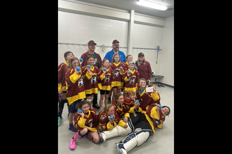 Lakeland Heat girls U11 Lacrosse team played in the Girls Rock Tournament in Calgary, bringing home bronze. Back row from the left: Sadie Wilkinson, assistant coach Chris Van Happen, head coach Eric Gaulin, and head coach Jaryn Stratychuk. Middle row from the left: Autumn Clarke, Bailey Van Happen, Falon Smale, Cedar Geres, and Zuri Lacoursiere. Front row from the left: Elizabeth Hancock, Briar Van Happen, Ella Foisy, Willa Fallow, Kirra Lindberg, Annick Brimacombe, and goalie Gema-Lee Gaulin.
