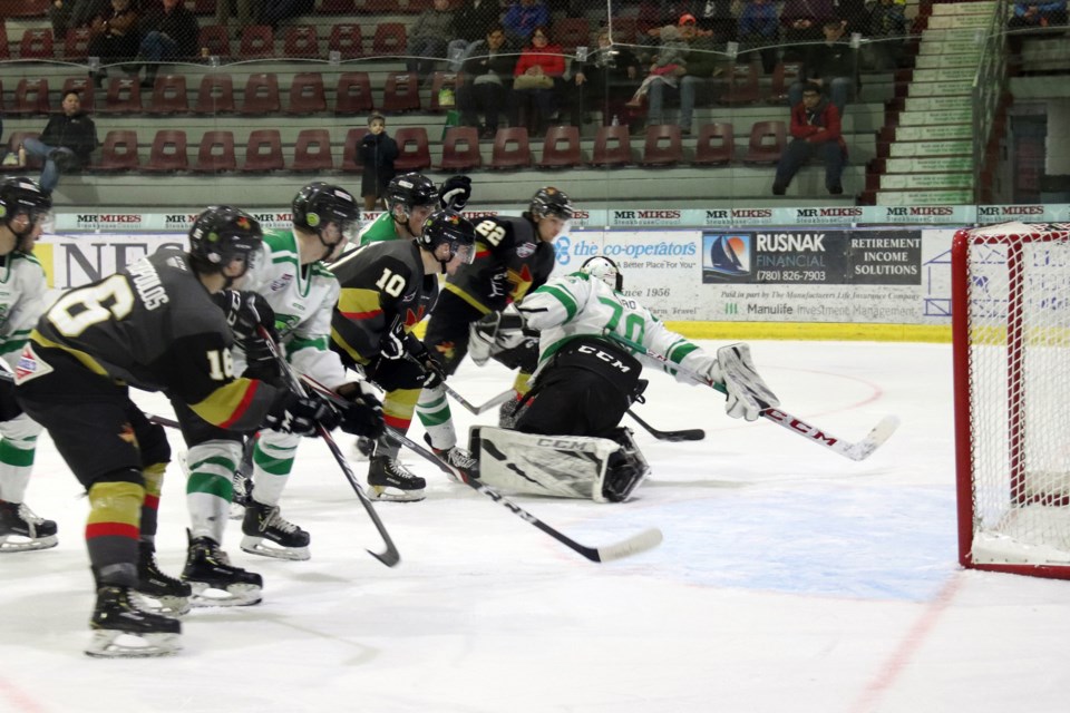 The Pontiacs storm the Drayton Valley Thunder’s net during their second game of the series on Sunday, March 1 at the R.J. Lalonde Arena. Photo by Meagan MacEachern. 