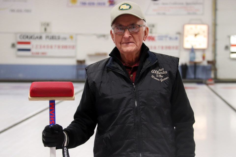 Bonnyville resident Gordon Hanna has been curling for over 50 years, and even at the age of 87, shows no signs of slowing down. Photo by Meagan MacEachern. 