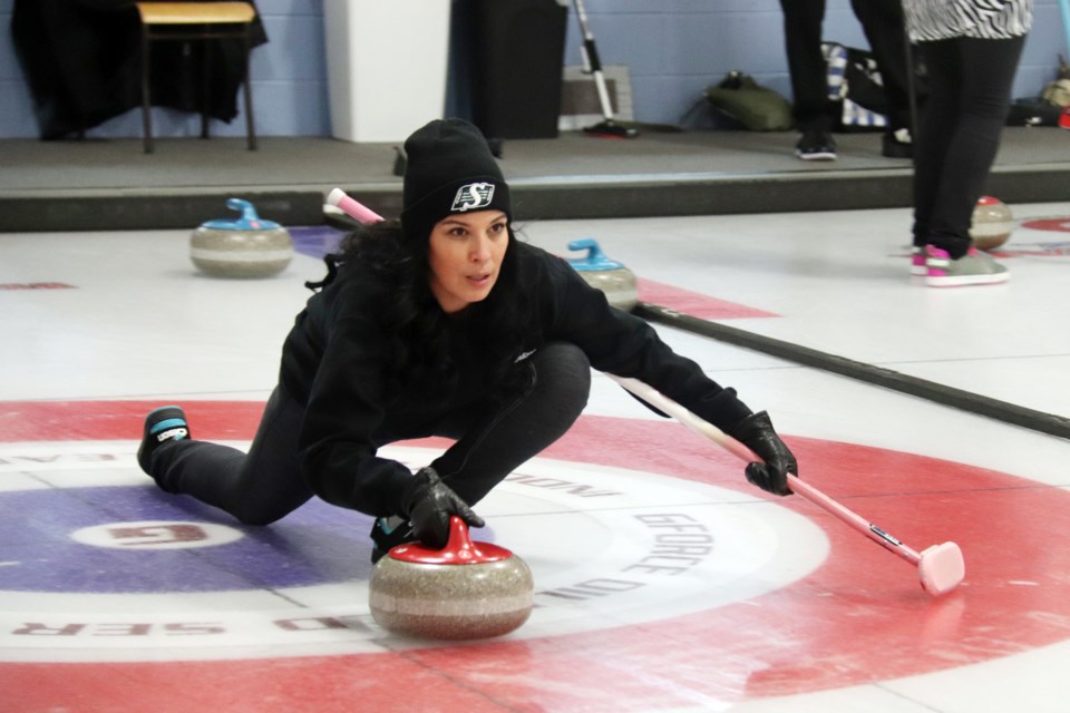 Gliding across the ice for her team during the Bonnyville Curling Clubs' women's bonspiel on Jan. 24 and 25 is Rinn Sanderson. Photo by Meagan MacEachern. 