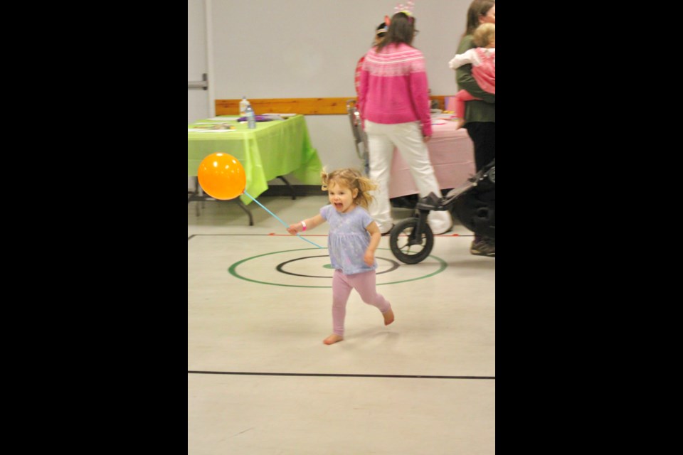Rosalie Pottelberg was fuelled up on easter treats and proceeded to rip around and around the hall, balloon in tow.  