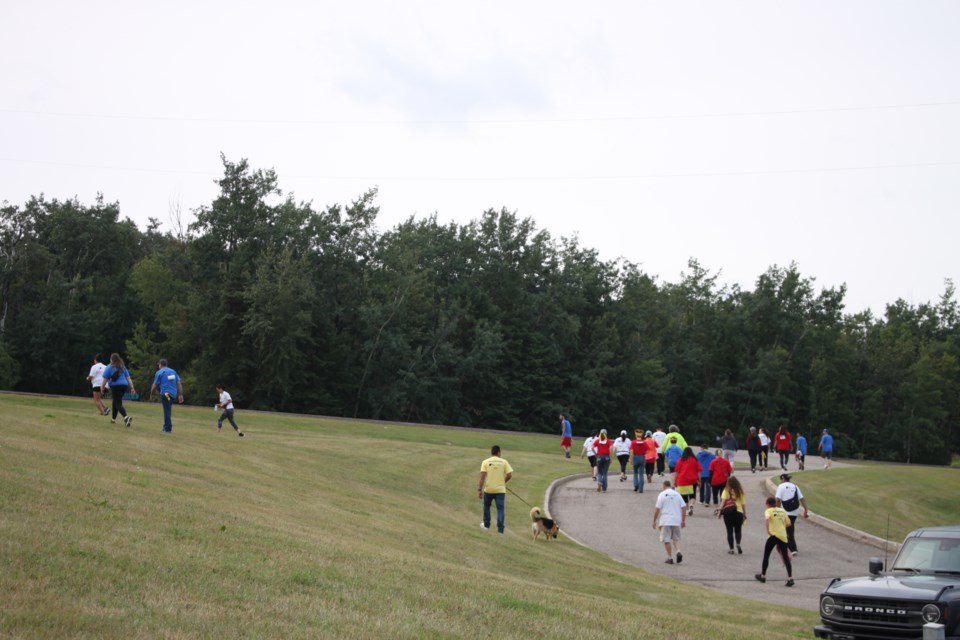 Participants of the Walk for Wellbriety set off for their 10 KM walk from the Bonnyville Indian and Métis Rehabilitation Centre