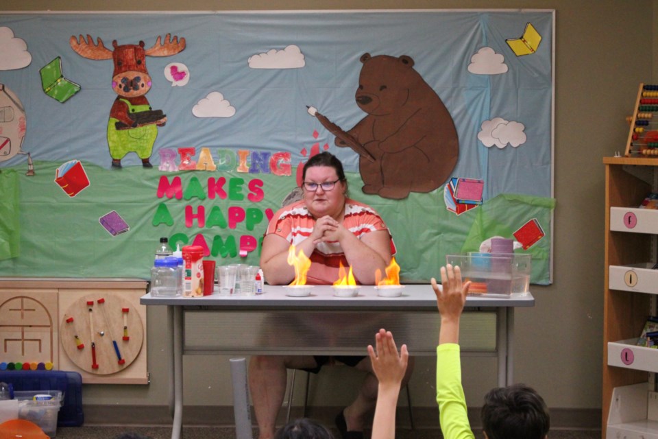 Heather Buerfeind, with the Alberta Science Network, gave a science demonstration at the Bonnyville Library, and the experiments that used fire were particularly popular. 