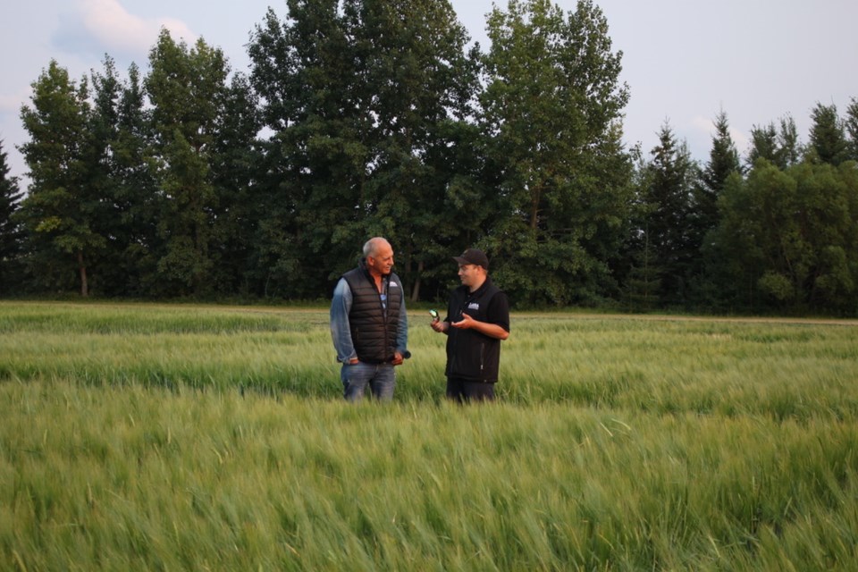 Lance Ouellette chats with MD of Bonnyville Coun. Don Slipchuk, who is on the LARA board of directors