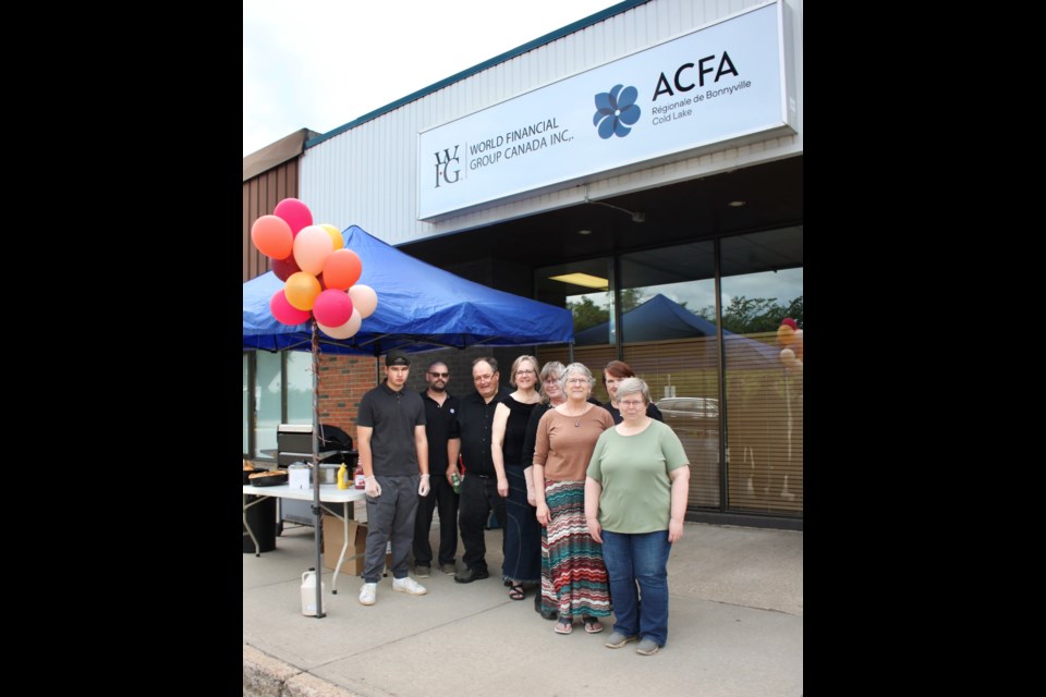 The World Financial Group in Bonnyville held a barbecue and auction fundraiser for the Street Heart Mission. From the left: Tanner Nordstrom, Cameron Nordstrom, Dave Collins, Crystal Richardson, Shereen Hook, Sherry Bourget, Janet Coulson, and Sharon Patterson.