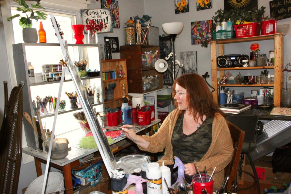 Tracy Law in her home studio in Fort Kent.