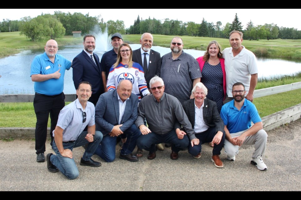 Dignitaries joined the Bonnyville District Chamber of Commerce for the opening ceremony of the Bonnyville Oil and Gas Show. Back row from the left: Scott Kovatch, MLA Scott Cyr, Deputy Reeve Darcy Skarsen, Mayor Elisa Brosseau, Coun. Don Slipchuk, Coun. Byron Johnson, Coun. Kayla Blanchette, Reeve Barry Kalinski. Front row from the left: CAO Ben Berlinguette, Coun. Mike Krywiak, Coun. Phil Kushnir, Coun. David Sharun, and CAO Quinton Wintfley.