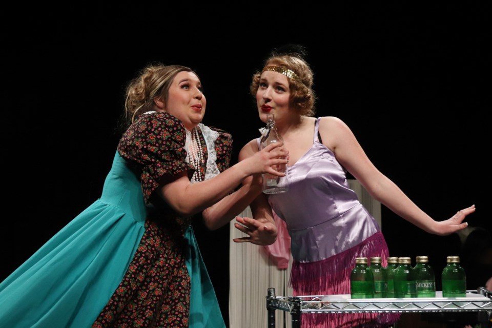 Mrs. Tottendale, played by McKenzie Armagost, and Janet, played by Erin Anderson, were two of the classic characters portrayed in BCHS' The Drowsy Chaperone. Photo by Meagan MacEachern. 