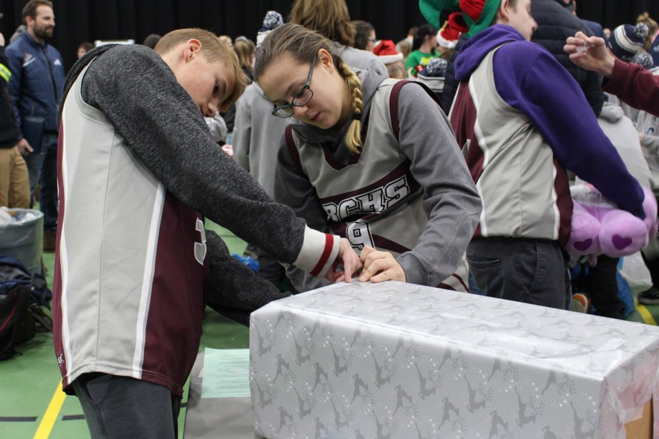 Elias Fraser-Marks and Taylor Barrett survey their handiwork. Photo by Robynne Henry