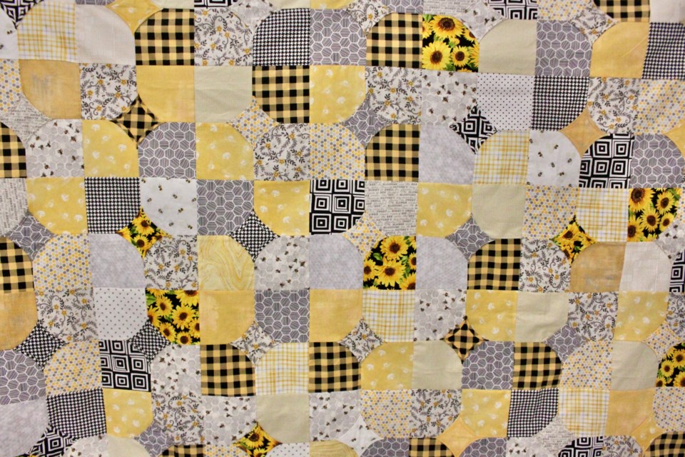 Tangled Threads Quilting Guild is a friendly club that fosters creativity, charity, and community.