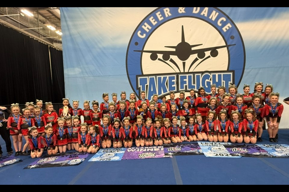 Bonnyville's Premier Academy Cheerleaders celebrate a successful competition at the Take Flight event in Cold Lake.
