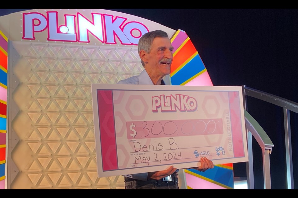 Denis Bourassa and his winnings from a May 2 Plinko game.