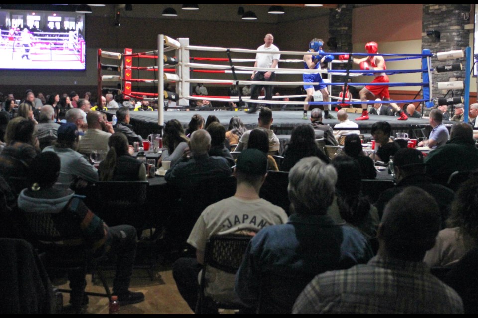 The crowd watches the action taking place in the ring during Saturday's Spring Break Up boxing competition. Chris McGarry photo. 